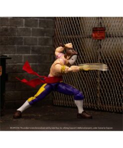 Figura de Vega en ataque frontal con garra dorada