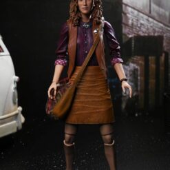 April O'Neil figura NECA TMNT 1990 con accesorios